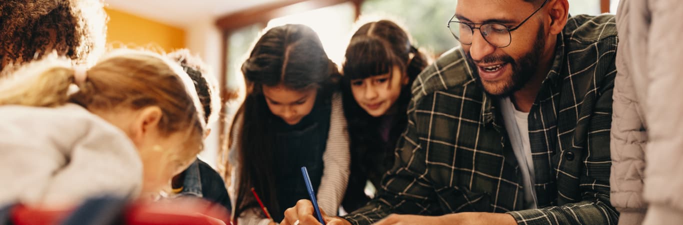 teacher working with children